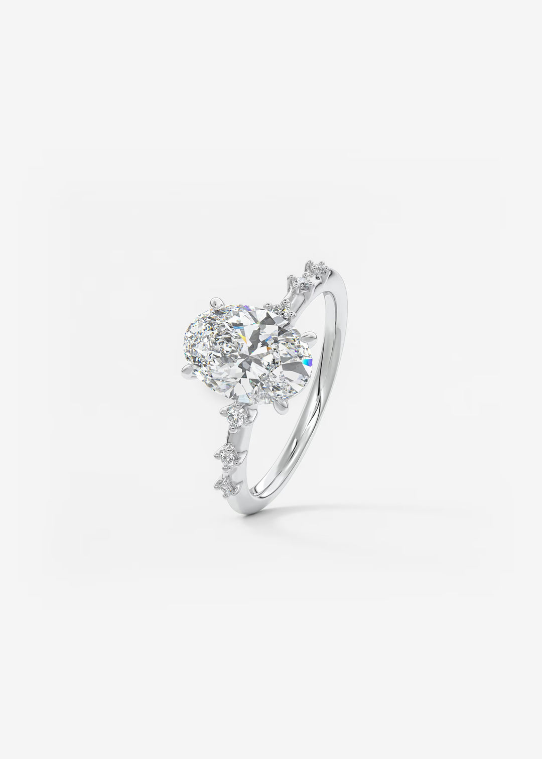 The Celeste Oval Engagement Ring with Delicate Diamond Accents#material_white