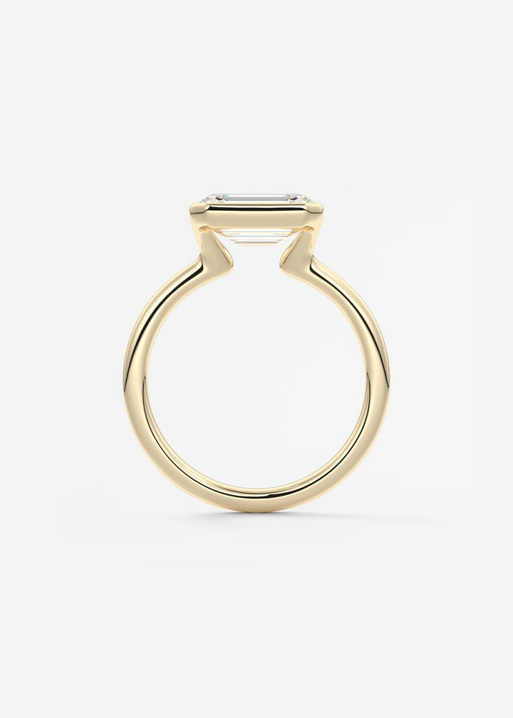The Colette Horizon Signature East West Emerald Cut Half Bezel Engagement Ring#material_gold