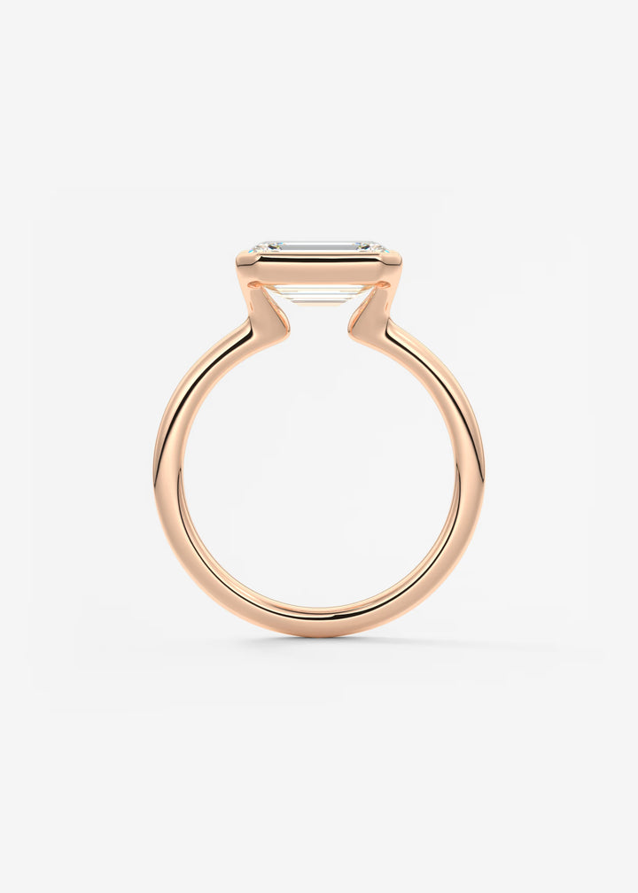 The Colette Horizon Signature East West Emerald Cut Half Bezel Engagement Ring#material_rose