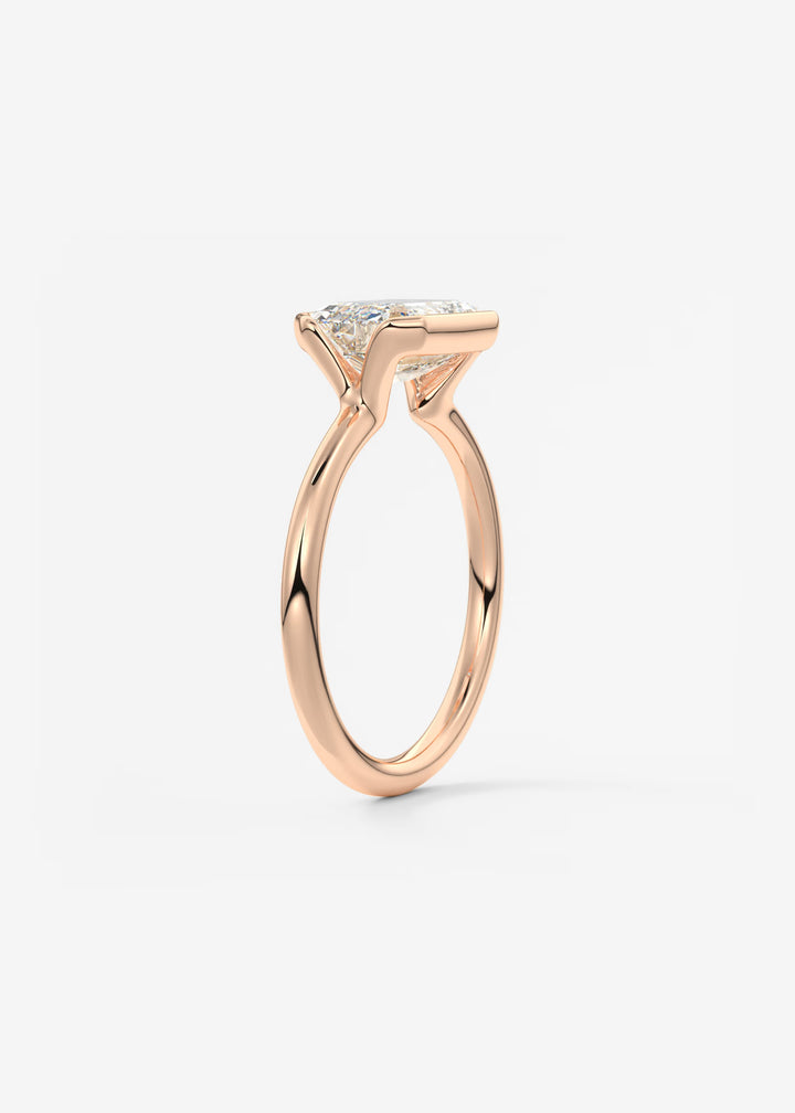 The Colette Horizon Signature East West Emerald Cut Half Bezel Engagement Ring#material_rose