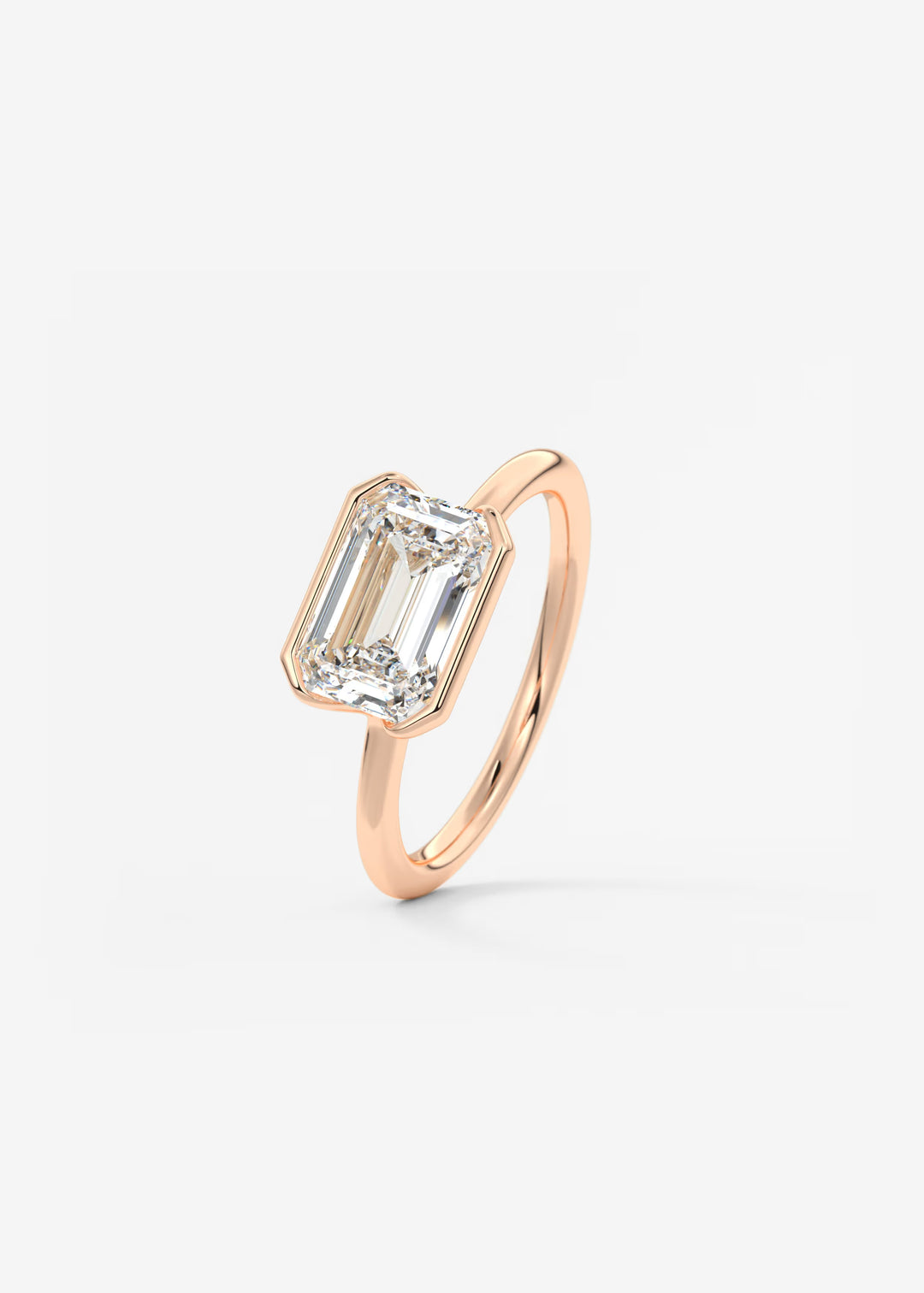 The Colette Horizon Signature East West Emerald Cut Half Bezel Engagement Ring#material_rose