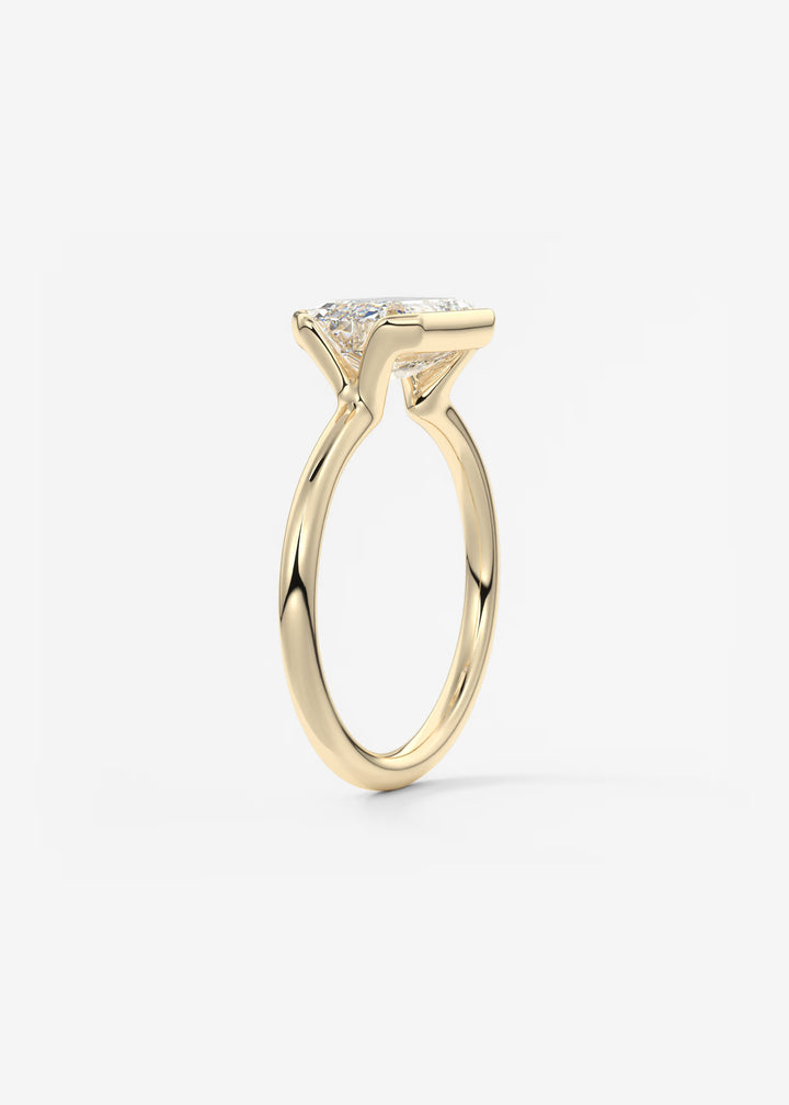 The Colette Horizon Signature East West Emerald Cut Half Bezel Engagement Ring#material_gold