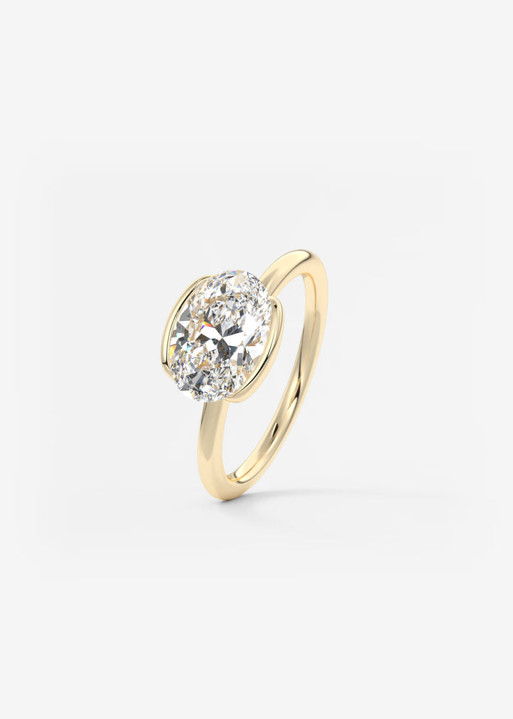 The Colette Horizon Signature East West Oval Cut Half Bezel Engagement Ring#material_gold