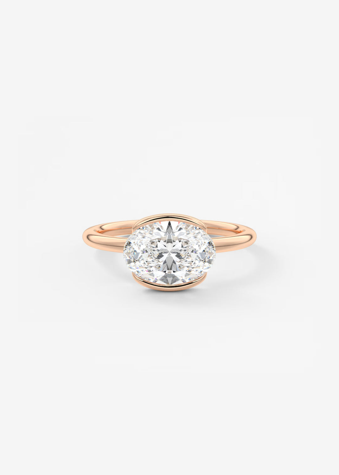 A rose gold engagement ring featuring a round brilliant-cut diamond set in a prong setting, centered on a clean white background.#material_rose