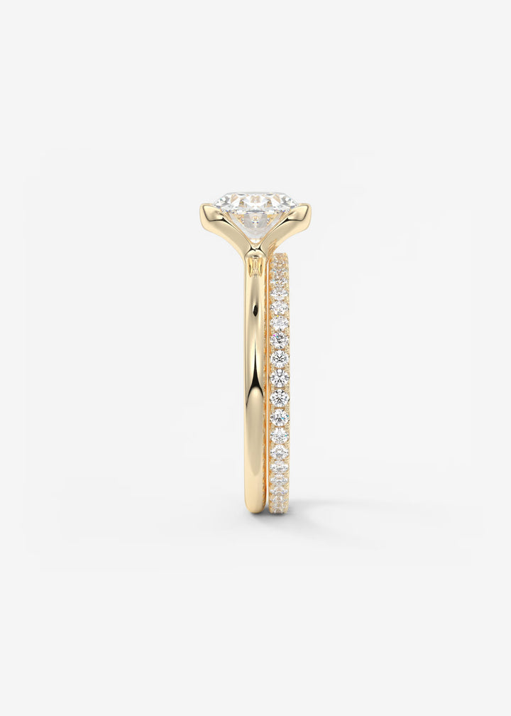 The Colette Horizon Signature East West Oval Cut Half Bezel Engagement Ring#material_gold