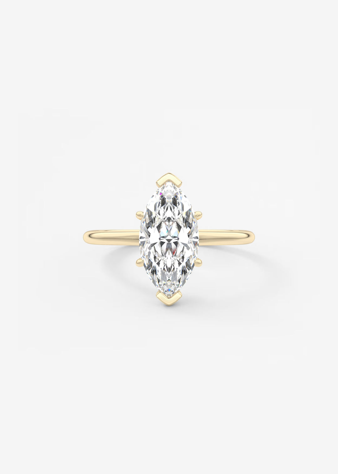 A yellow gold ring featuring a marquise-cut clear gemstone in a prong setting, centered on a light gray background.#material_gold