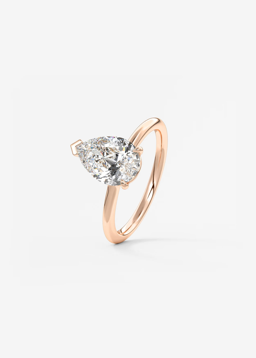 The Colombe Modern Pear Cut Engagement Ring with Stackable, Low Profile Open Basket#material_rose