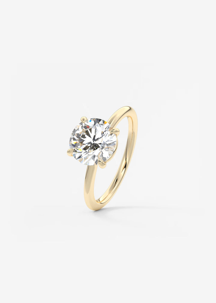 The Colombe Modern Round Solitaire Engagement Ring with Stackable, Low Profile Open Basket#material_gold