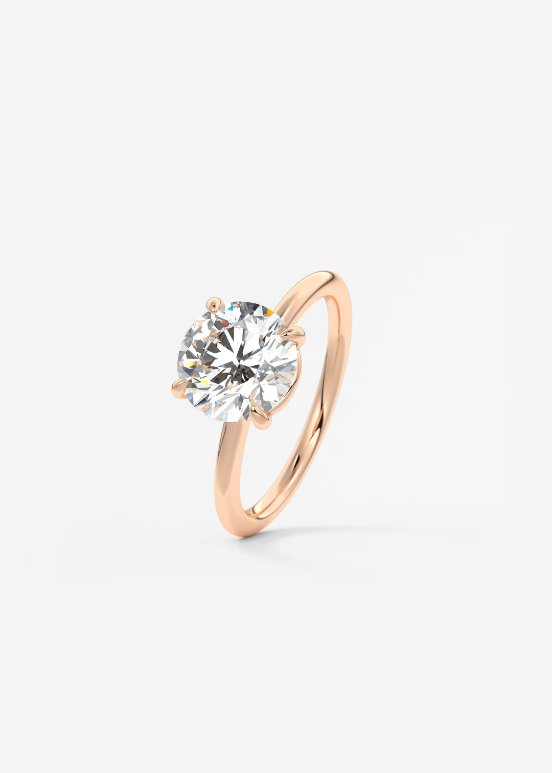 The Colombe Modern Round Solitaire Engagement Ring with Stackable, Low Profile Open Basket#material_rose