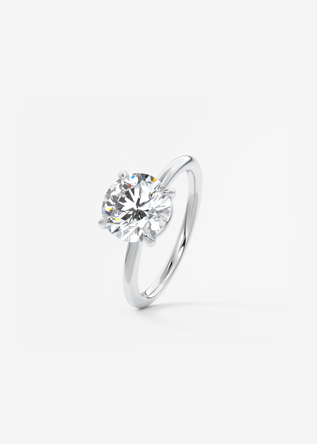 The Colombe Modern Round Solitaire Engagement Ring with Stackable, Low Profile Open Basket#material_white