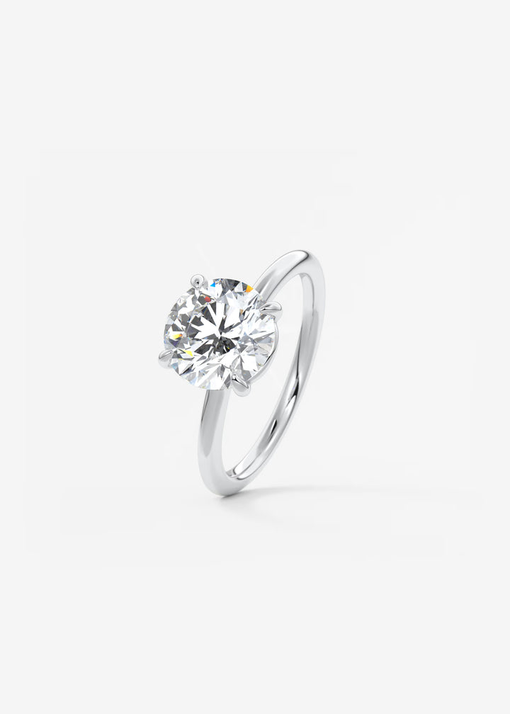 The Colombe Modern Round Solitaire Engagement Ring with Stackable, Low Profile Open Basket#material_white