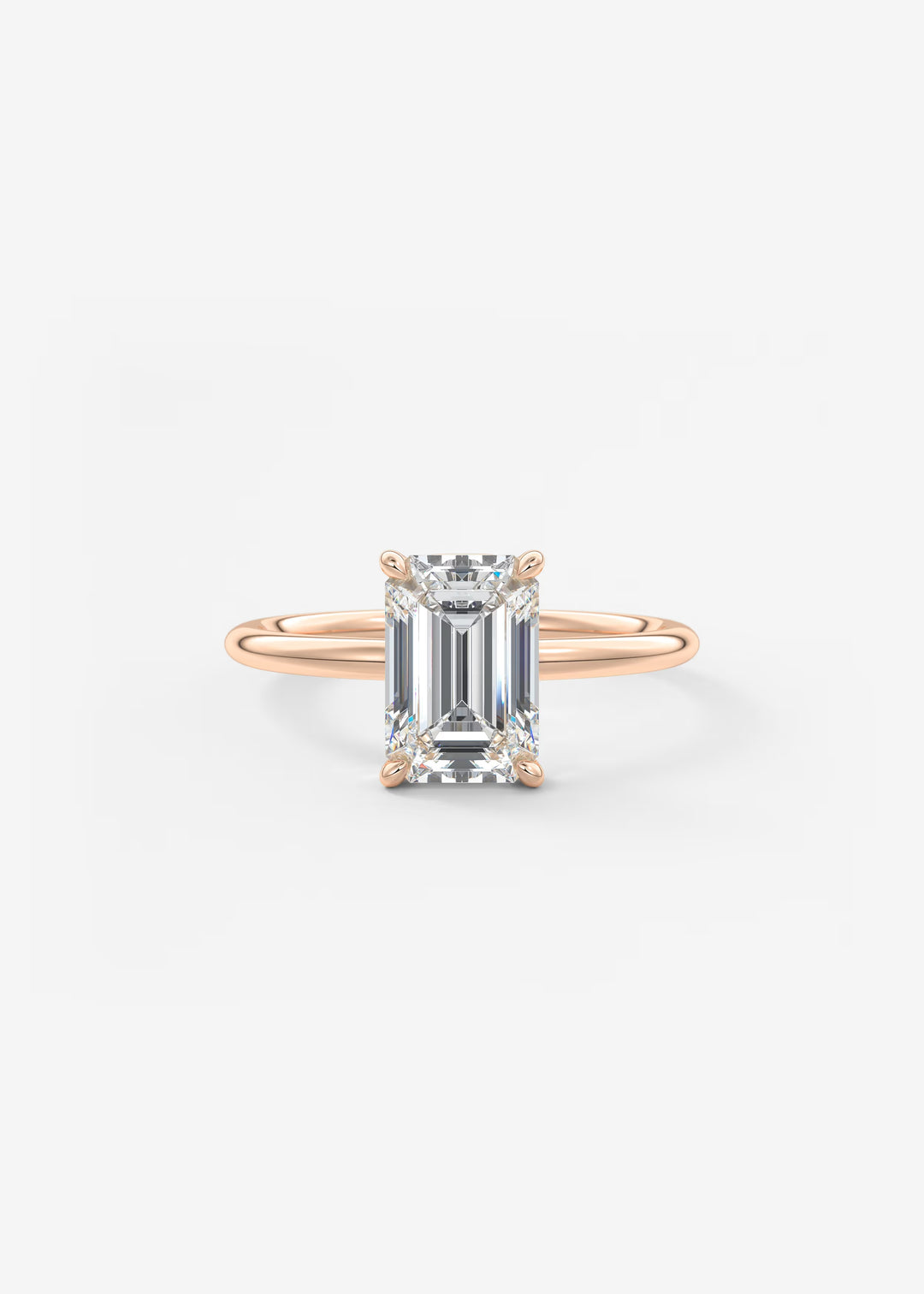 Rose Gold ring with a diamond on a white background#material_rose