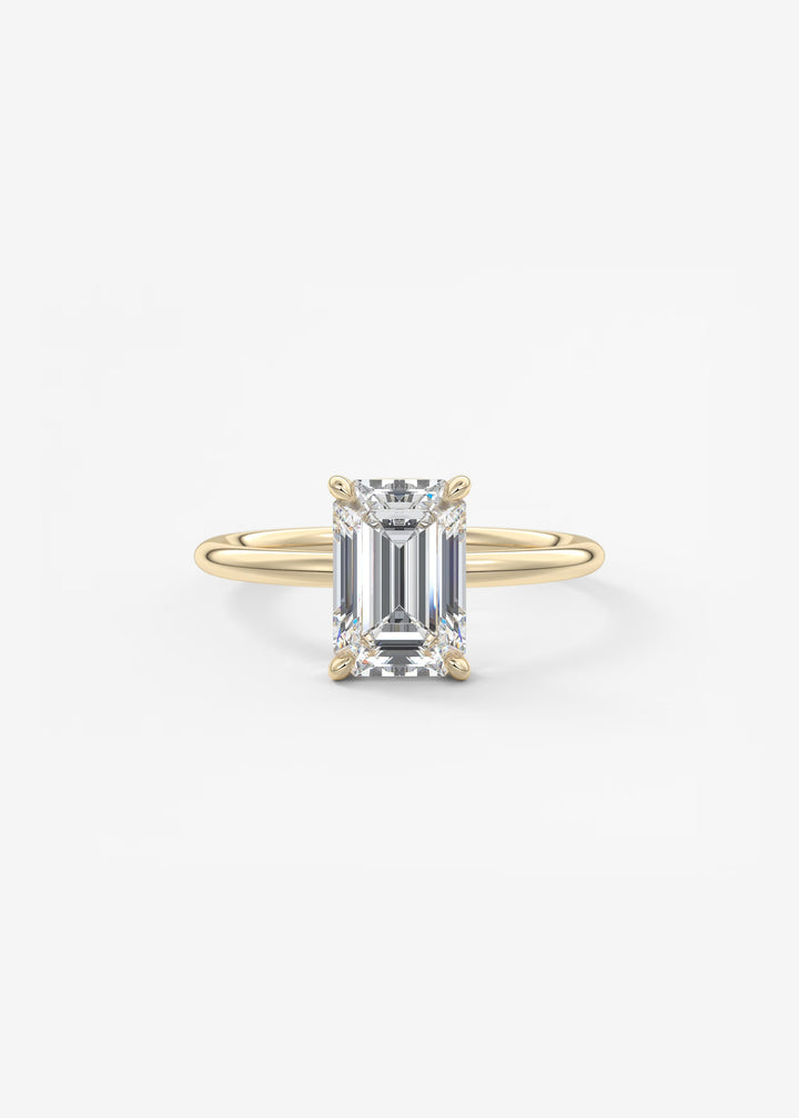 Gold ring with a diamond on a white background#material_gold
