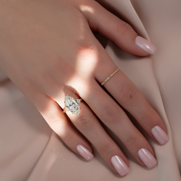 The Hearts Leona Marquise Lab Diamond Moissanite Engagement Ring *Shown with 5 ct #material_gold