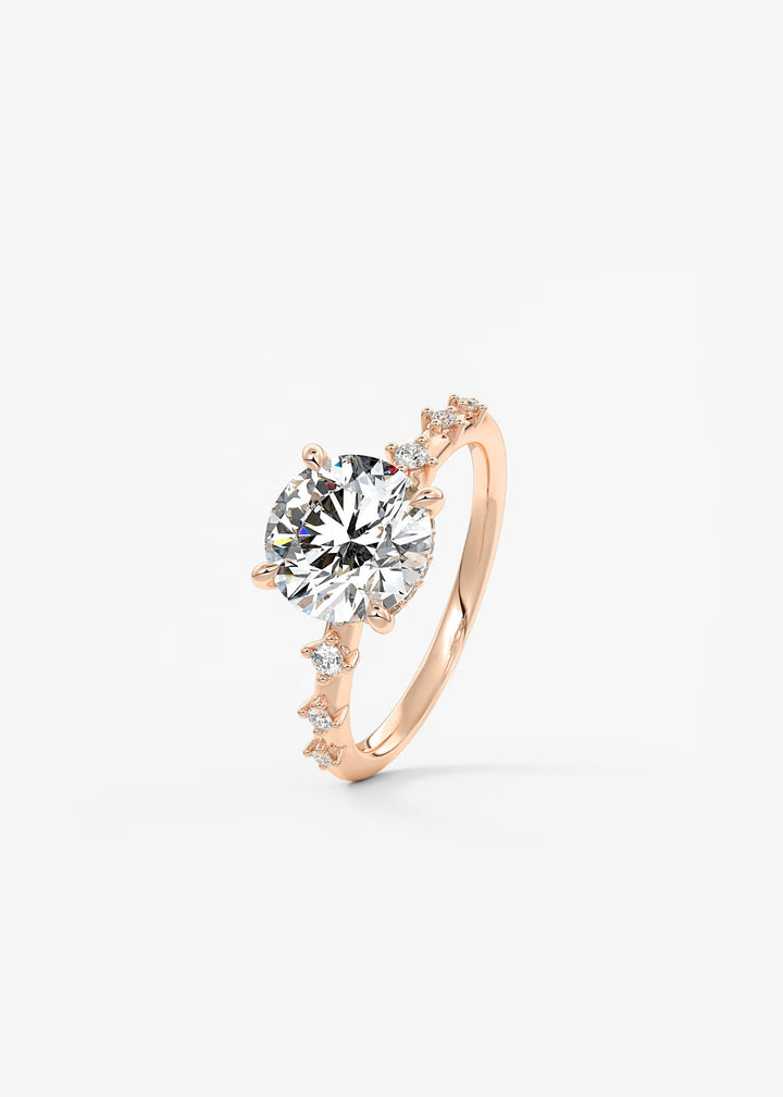 The Hidden Halo Celeste Round Engagement Ring with Delicate Diamond Accents and Hidden Halo#material_rose