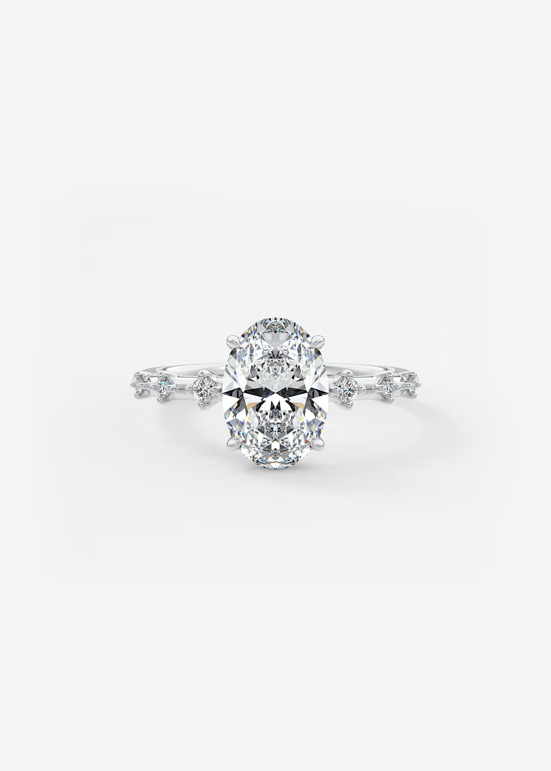 A radiant cut diamond engagement ring in a silver-colored setting with a halo design and small accent diamonds along the band, shown on a clean white background.#material_white