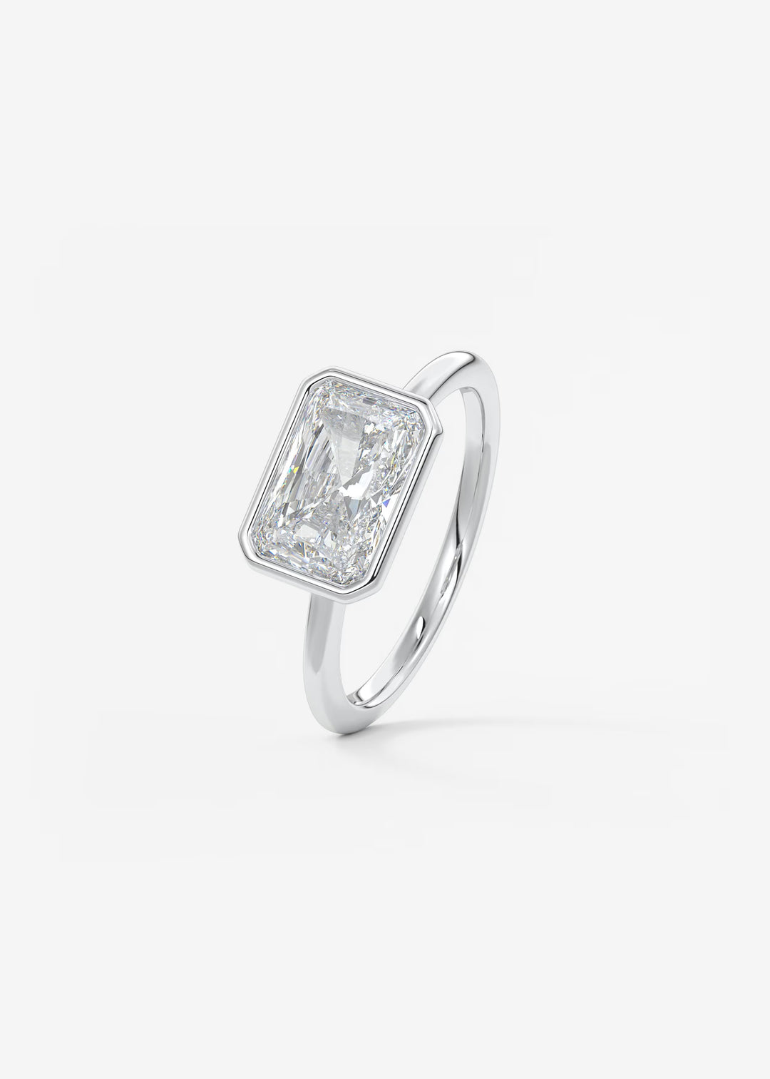 The Laurier Horizon East West Cut Bezel Set Engagement Ring#material_white