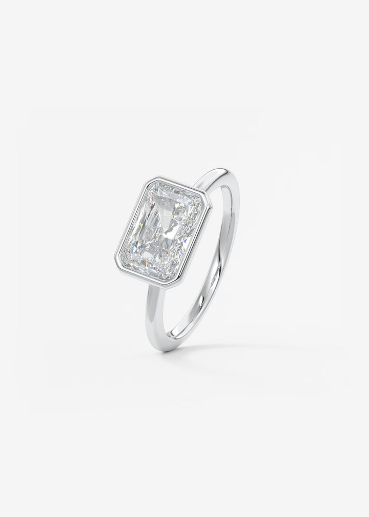 The Laurier Horizon East West Cut Bezel Set Engagement Ring#material_white