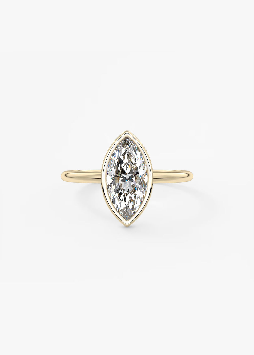 A yellow gold ring featuring a marquise-cut diamond in a bezel setting, centered on a clean white background.#material_gold
