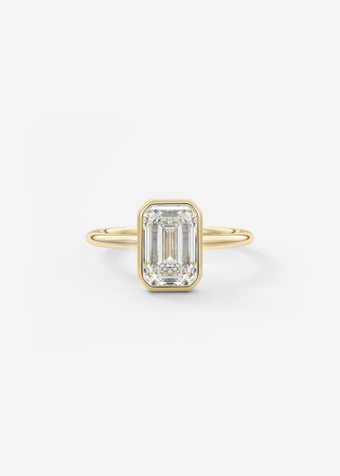 Gold ring with a rectangular diamond on a light gray background#material_gold