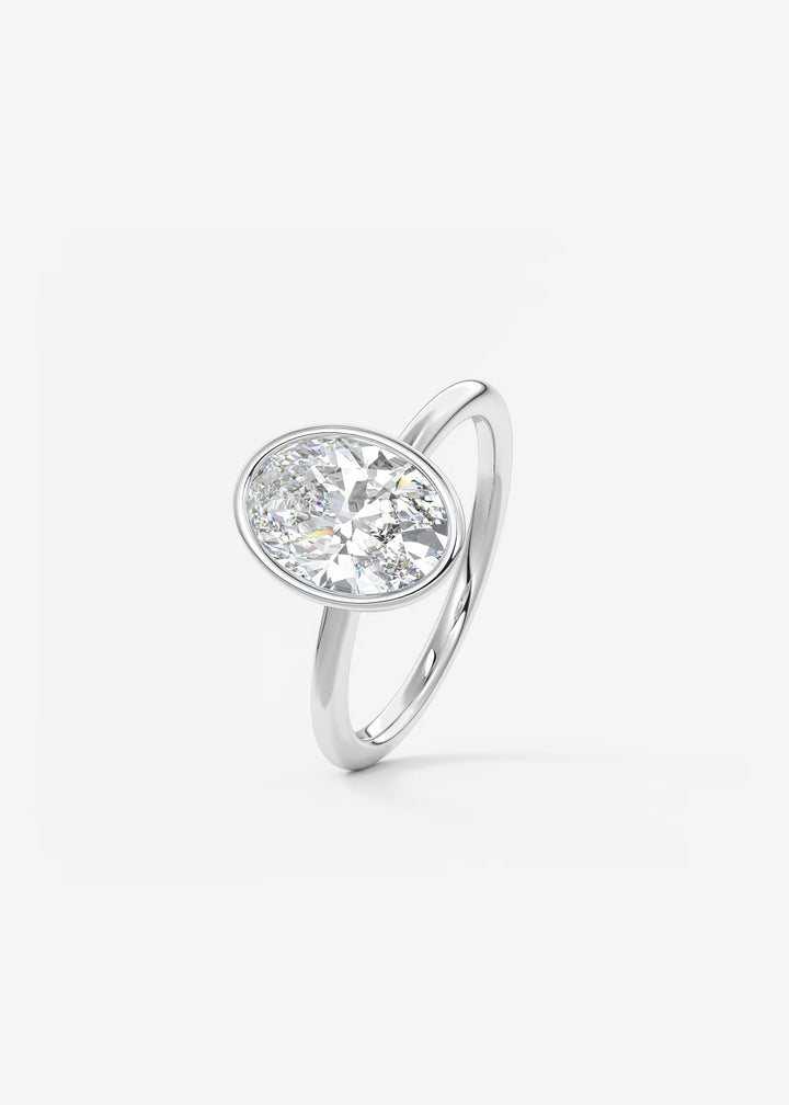 The Laurier Low Profile Oval Cut Bezel Set Engagement Ring#material_white