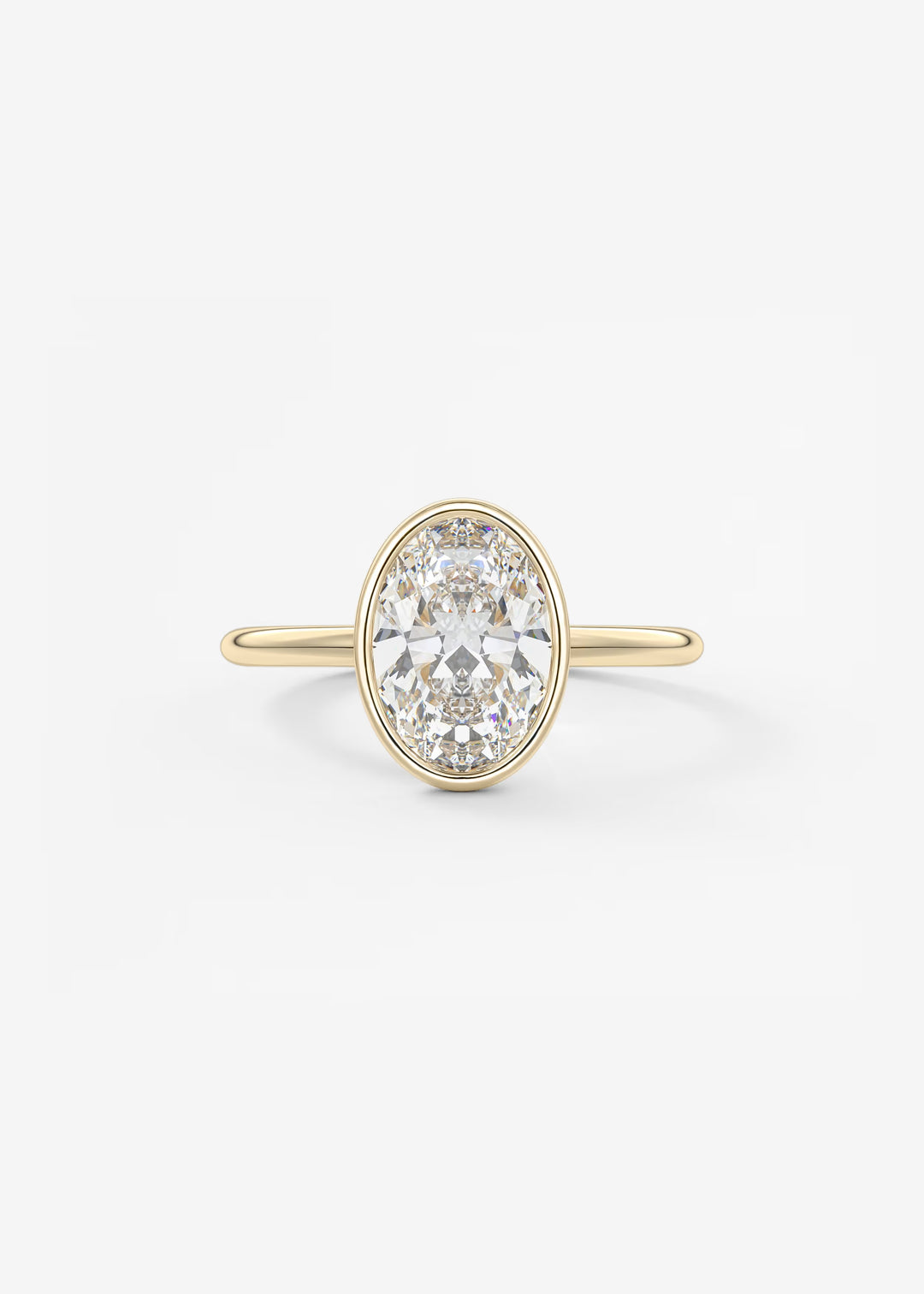A yellow gold ring featuring a large oval-cut clear gemstone in a prong setting, with a polished band, shown against a plain white background.#material_gold