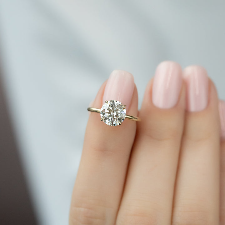 The Logan Round Lab Diamond Moissanite Engagement Ring *Shown with 2.5 ct #material_gold
