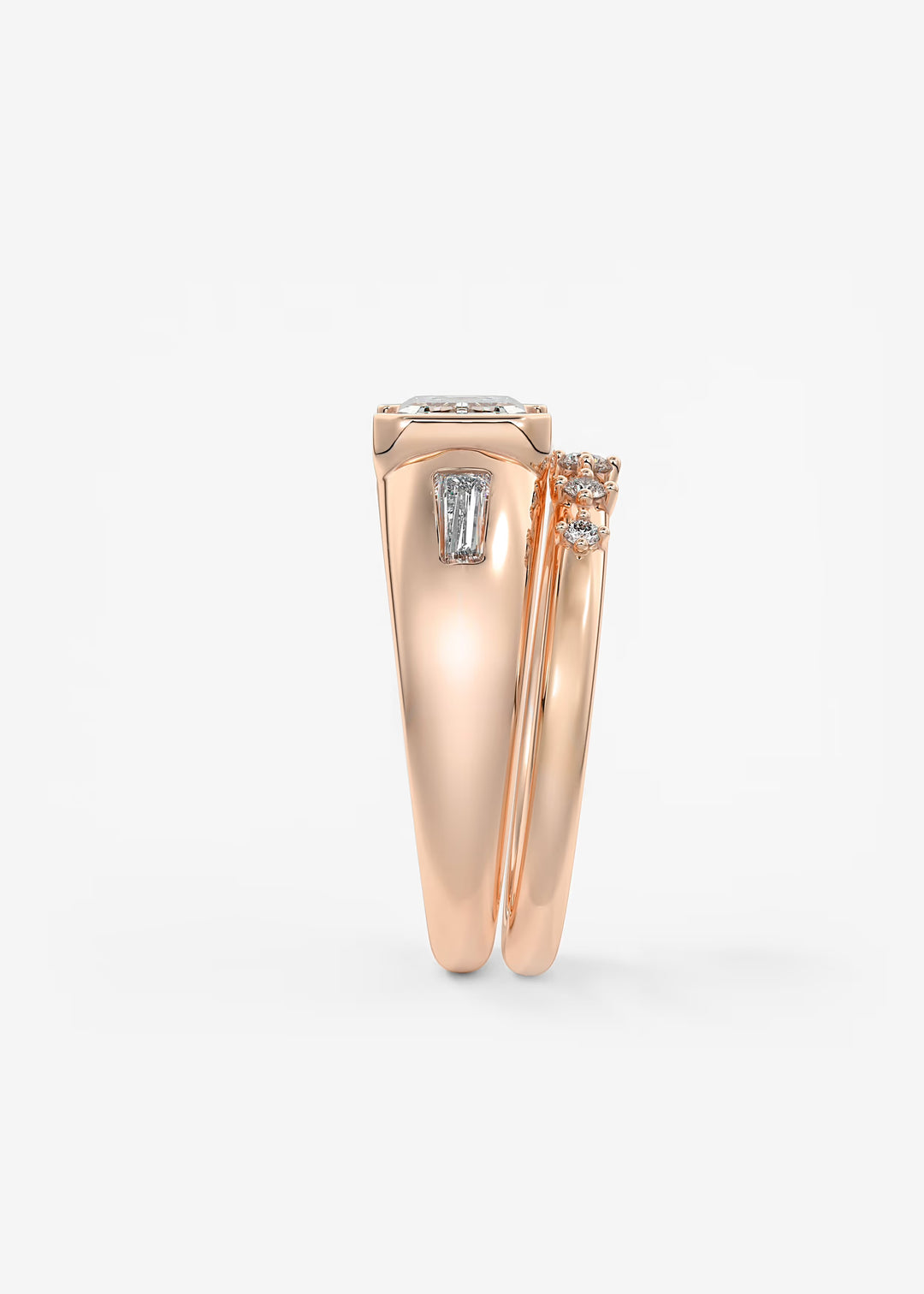 The Lune Trio Emerald Cut Half Bezel Three Stone Engagement Ring with Peekaboo Gallery and Tapered Baguettes#material_rose