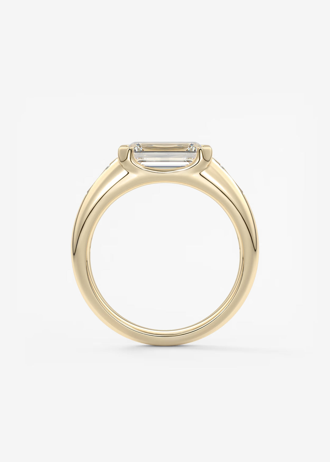 The Lune Trio Emerald Cut Half Bezel Three Stone Engagement Ring with Peekaboo Gallery and Tapered Baguettes#material_gold