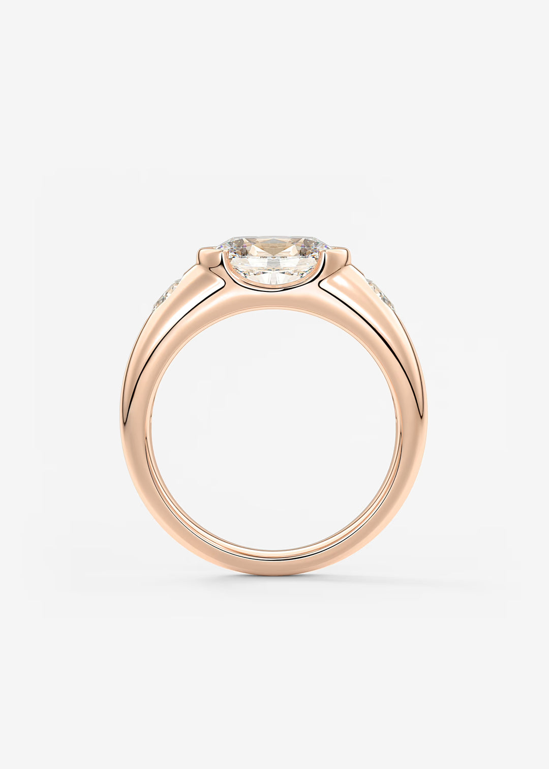 The Lune Trio Oval Cut Half Bezel Three Stone Engagement Ring with Peekaboo Gallery and Tapered Baguettes#material_rose