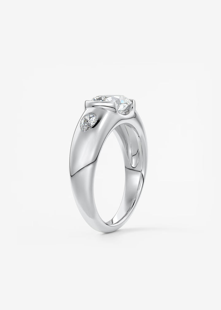 The Lune Trio Oval Cut Half Bezel Three Stone Engagement Ring with Peekaboo Gallery and Tapered Baguettes#material_white