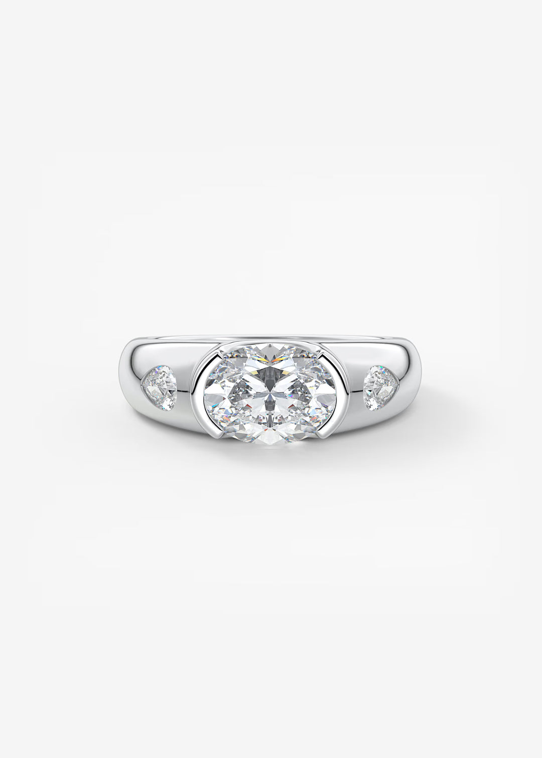 A silver-toned diamond ring with a large round-cut center stone and two smaller marquise-cut side stones, shown on a clean white background.#material_white