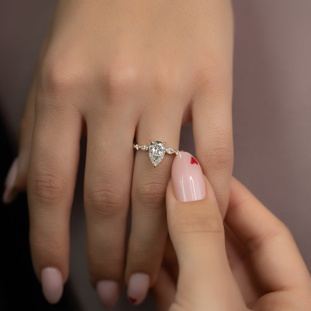 The Lyra Pear Lab Diamond Moissanite Engagement Ring
