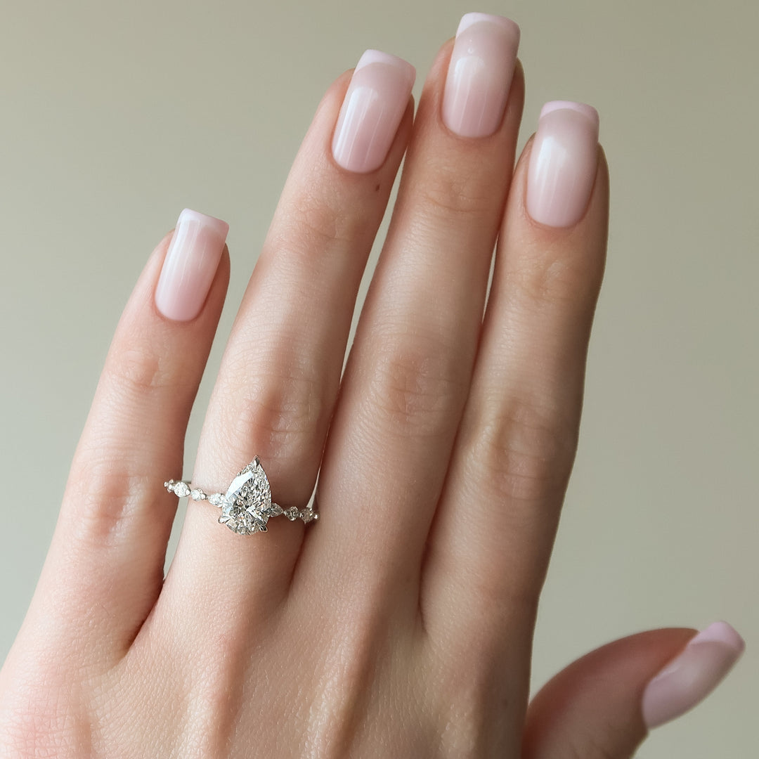 The Lyra Pear Lab Diamond Moissanite Engagement Ring