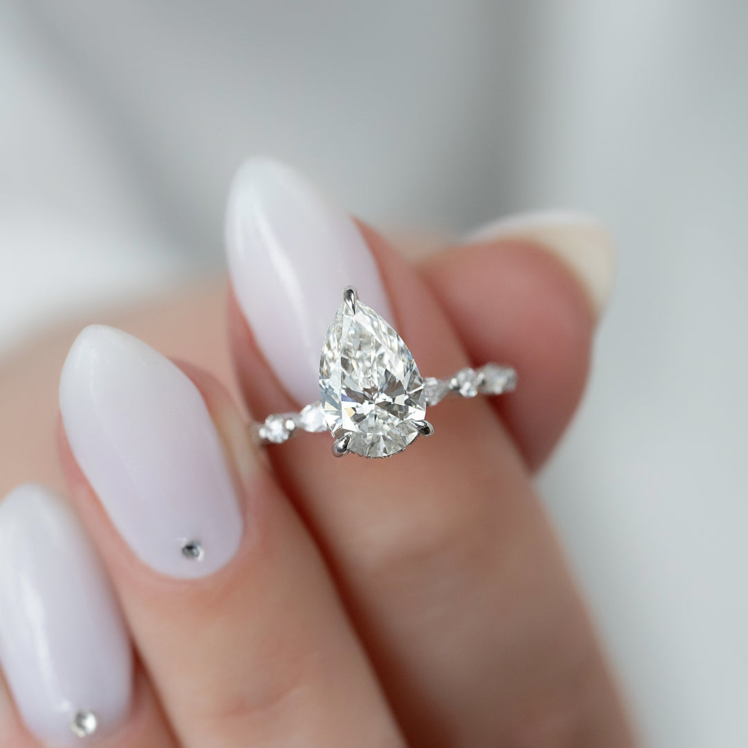 The Lyra Pear Lab Diamond Moissanite Engagement Ring