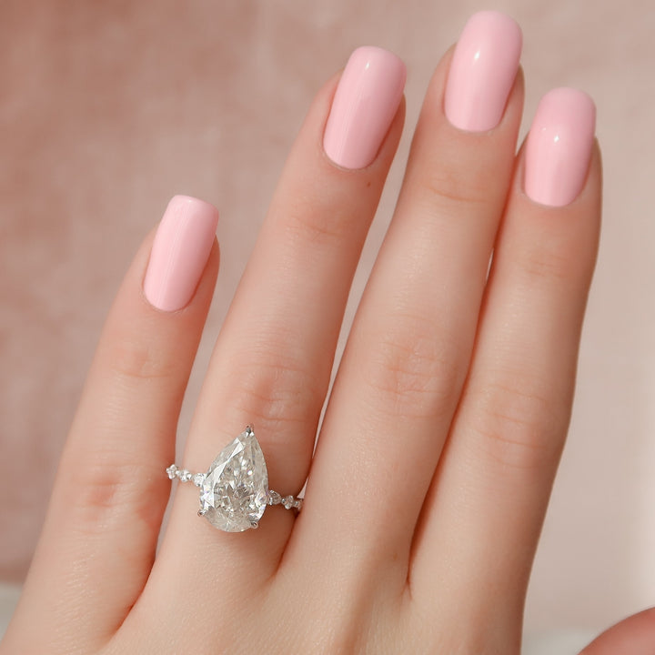 The Lyra Pear Lab Diamond Moissanite Engagement Ring *Shown with 5 ct #material_white