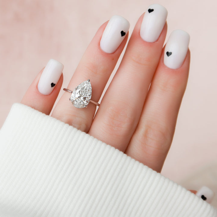The Mabel Pear Lab Diamond Moissanite Engagement Ring *Shown with 3 ct #material_white
