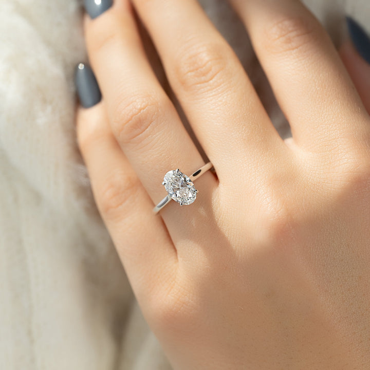 The Natasha Oval Lab Diamond Moissanite Engagement Ring *Shown with 1.5 ct #material_white