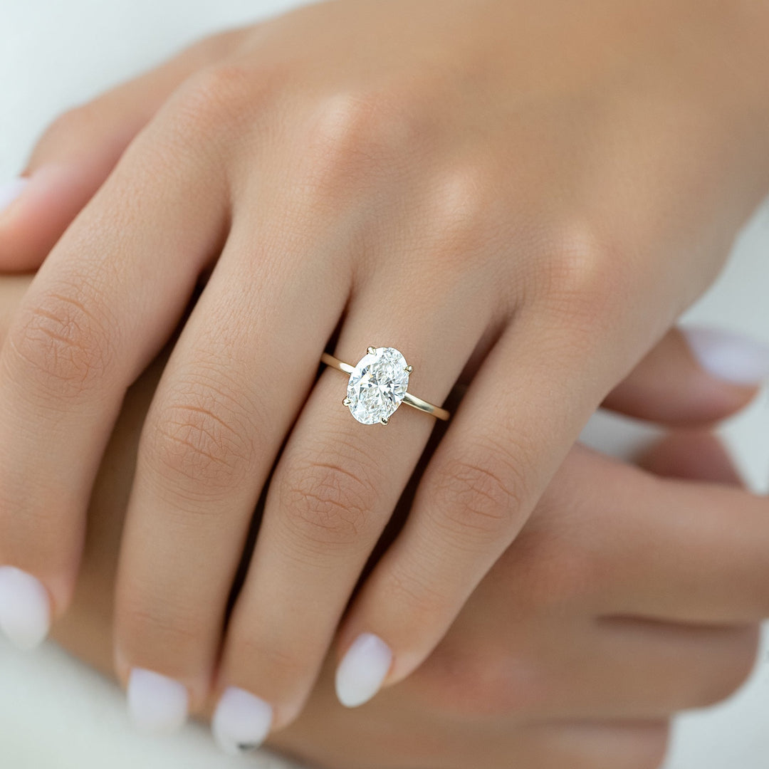 The Navy Oval Lab Diamond Moissanite Engagement Ring
