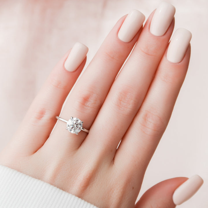 The Navy Round Lab Diamond Moissanite Engagement Ring *Shown with 2 ct #material_white