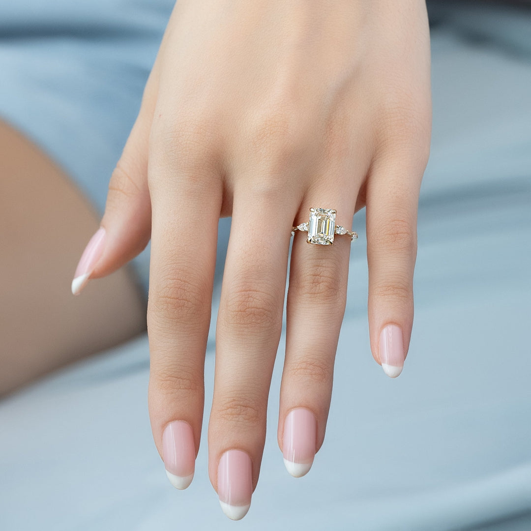 The Niko Emerald Lab Diamond Moissanite Engagement Ring