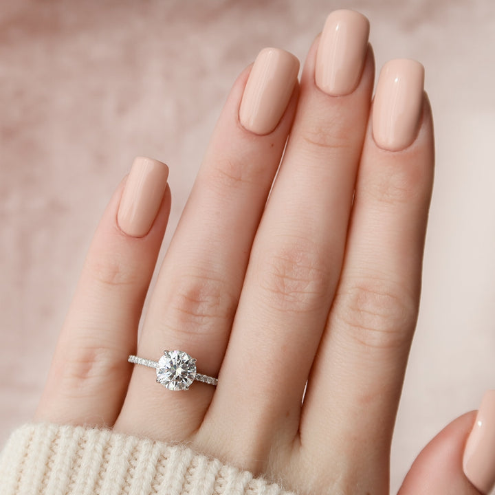 The Pave April Round Lab Diamond Moissanite Engagement Ring *Shown with 1.5 ct #material_white