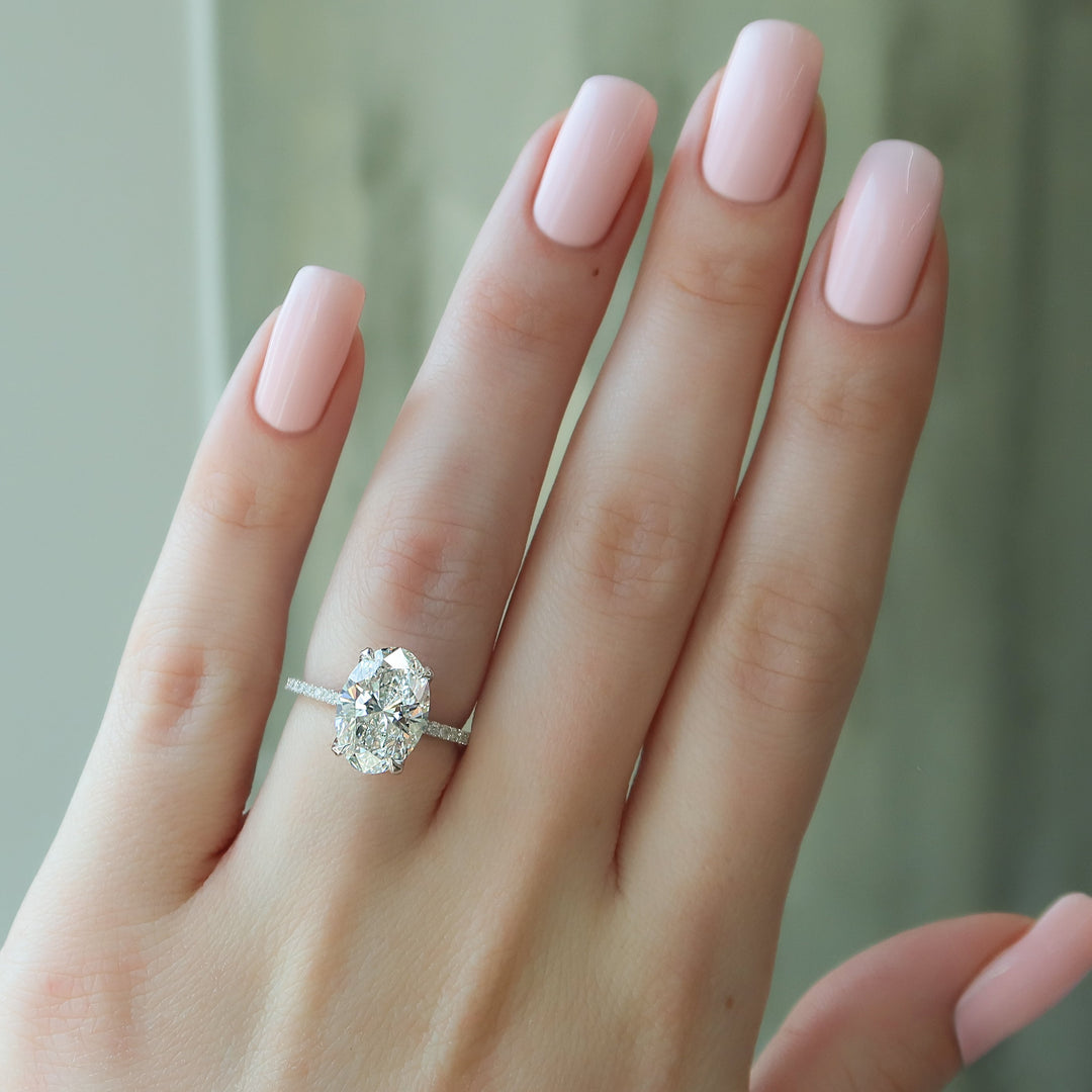 The Pave Navy Oval Lab Diamond Moissanite Engagement Ring