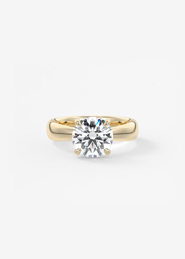 Gold ring with a diamond on a white background#material_gold