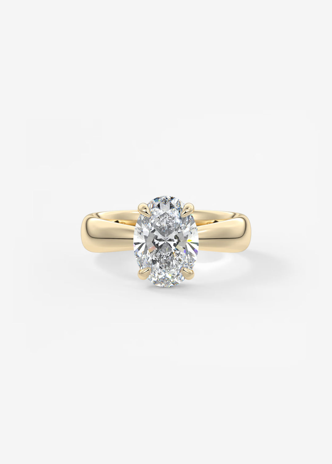 A yellow gold solitaire engagement ring featuring a large oval-cut diamond, set against a clean white background.#material_gold