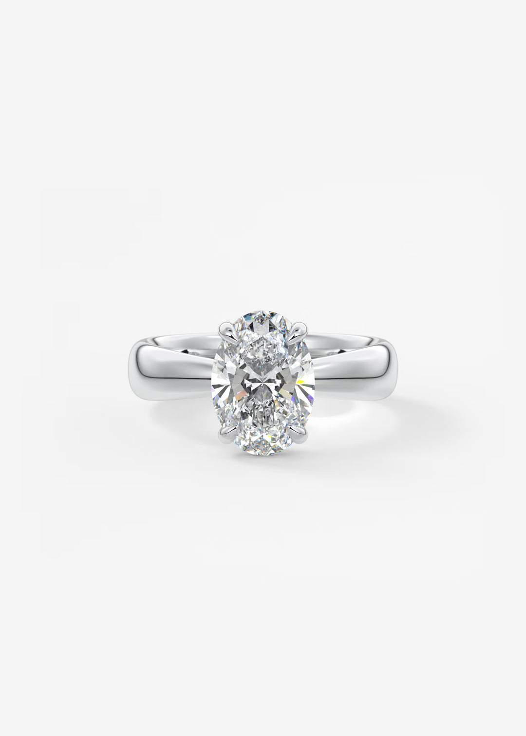 A classic diamond engagement ring with a round brilliant-cut center stone set in a polished silver-colored band, shown on a clean white background.#material_white