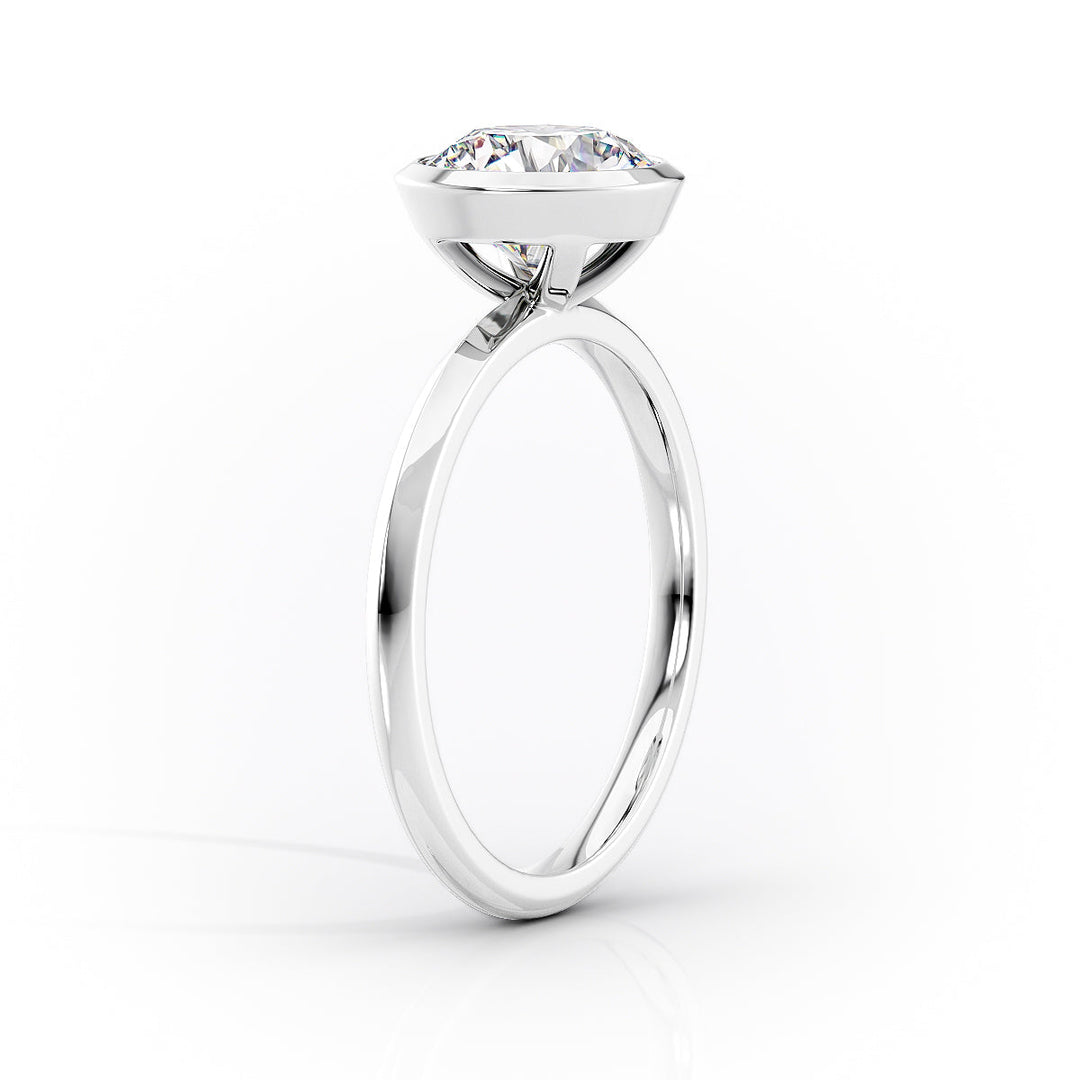 The Razor Bezel Liberty Set With A Pear Lab Diamond#material_white