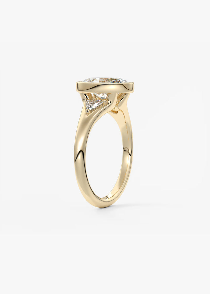 The Solene Bezel Set Oval & Trillion Split Shank Engagement Ring#material_gold