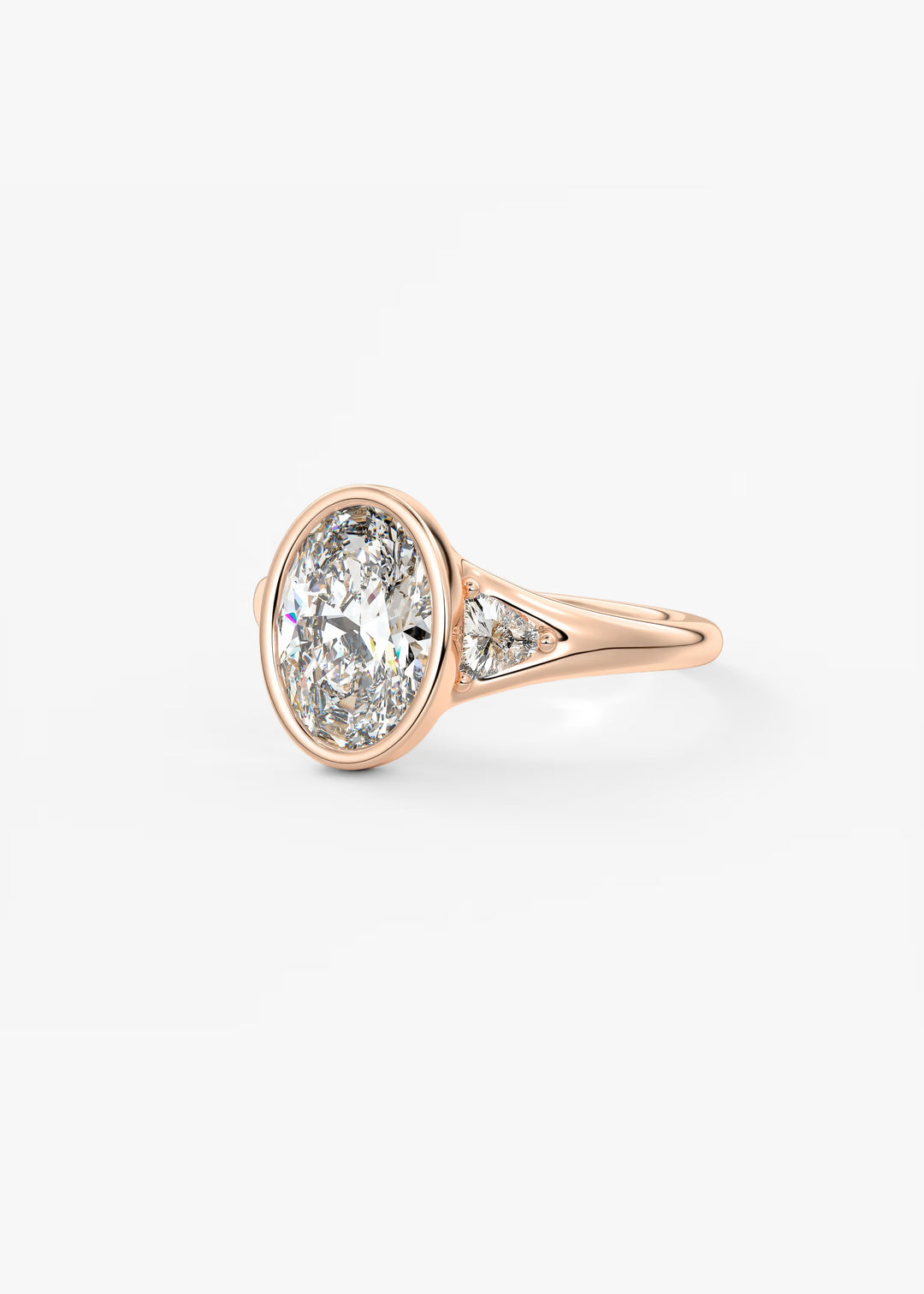 The Solene Bezel Set Oval & Trillion Split Shank Engagement Ring#material_rose