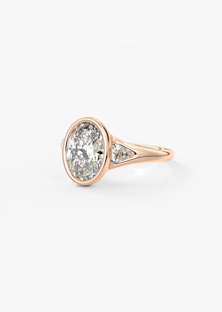 The Solene Bezel Set Oval & Trillion Split Shank Engagement Ring#material_rose